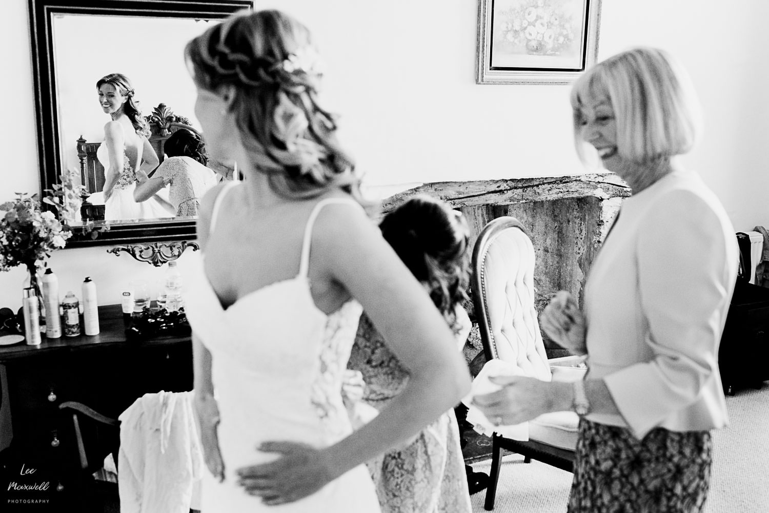 Bride looking into mirror