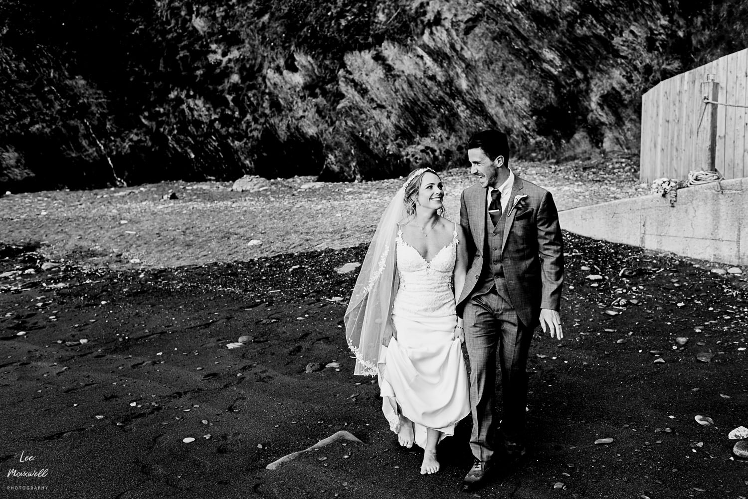 Relaxed wedding portrait at Tunnels Beaches