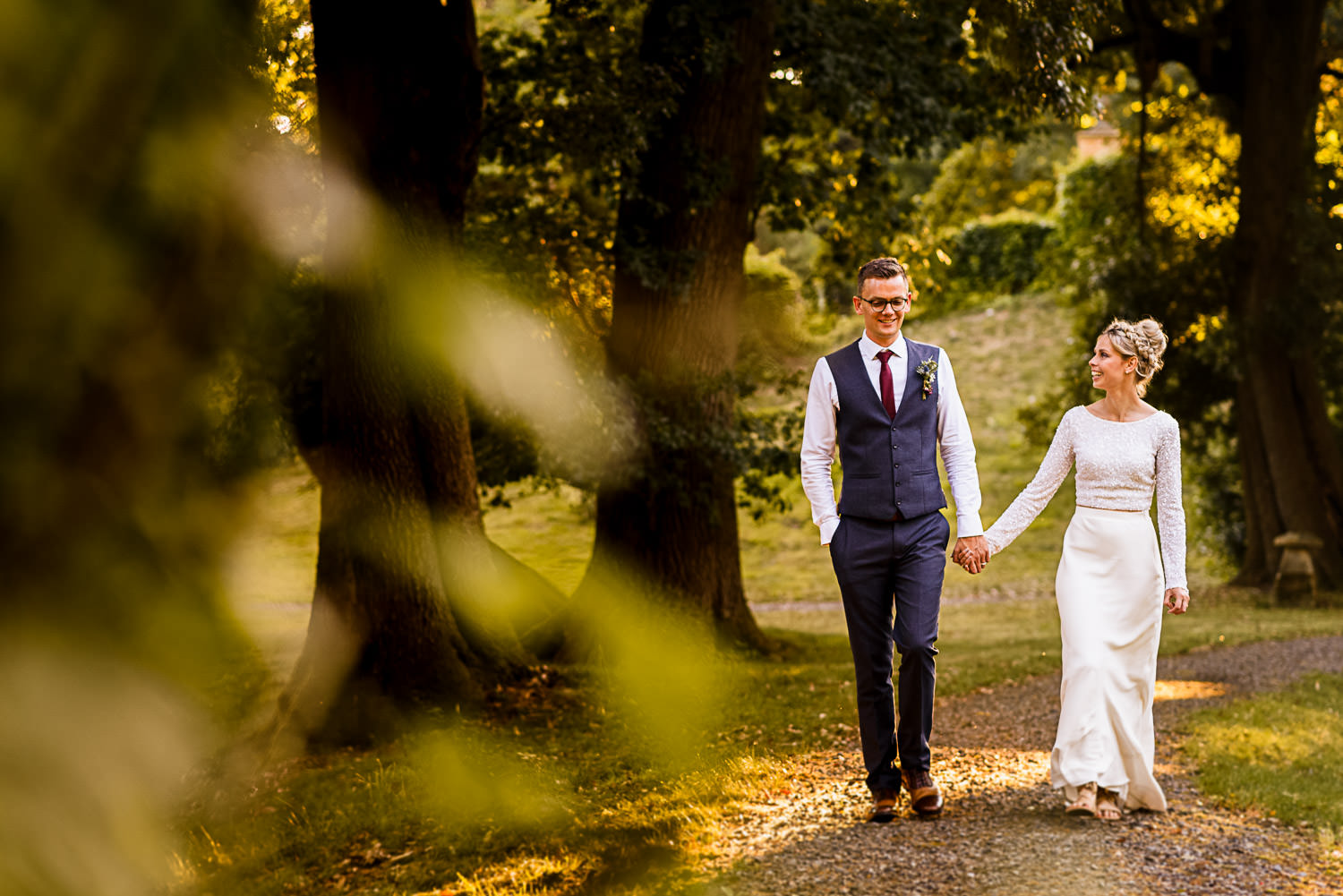 walking portrait with bride and groom