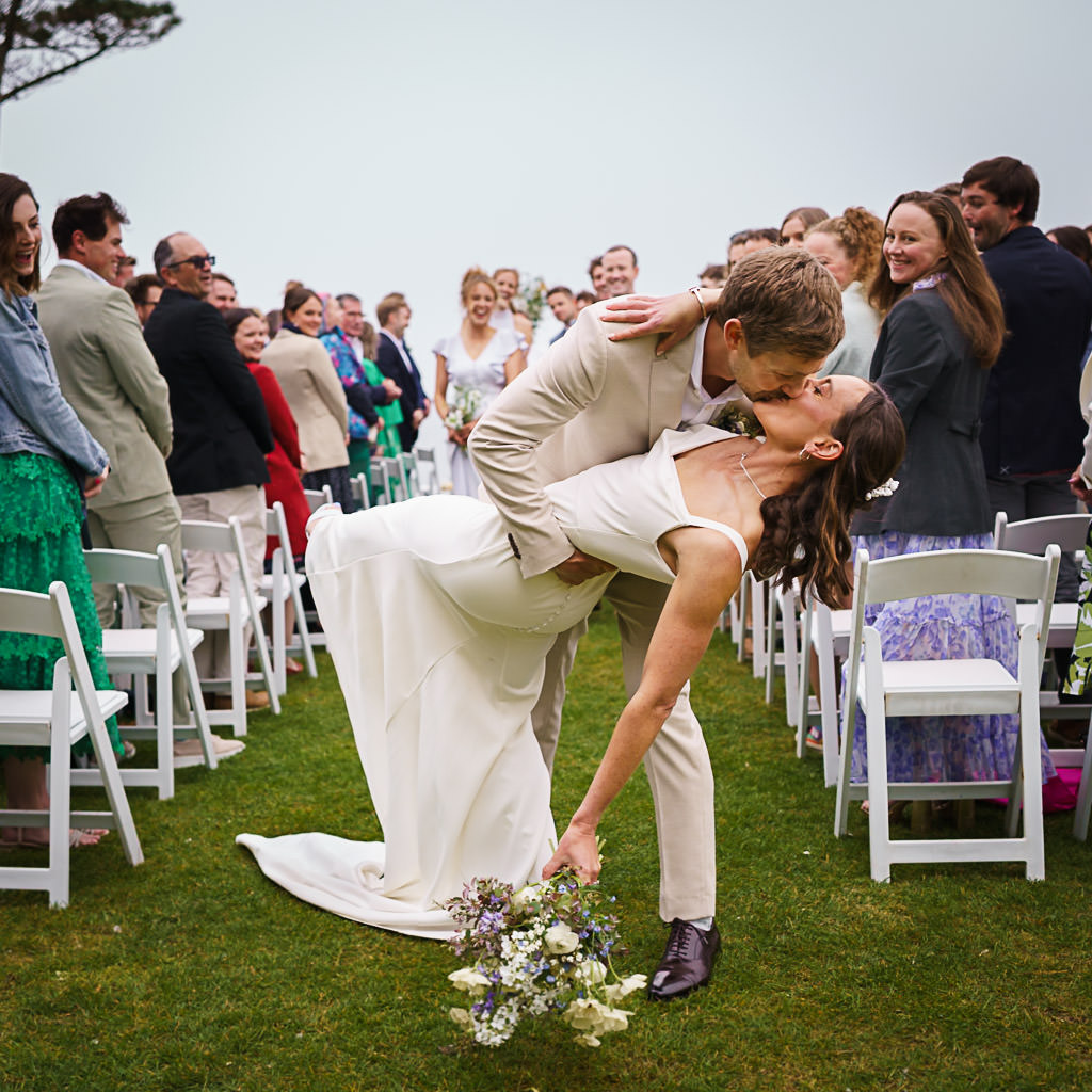 Devon wedding ceremony dip kiss