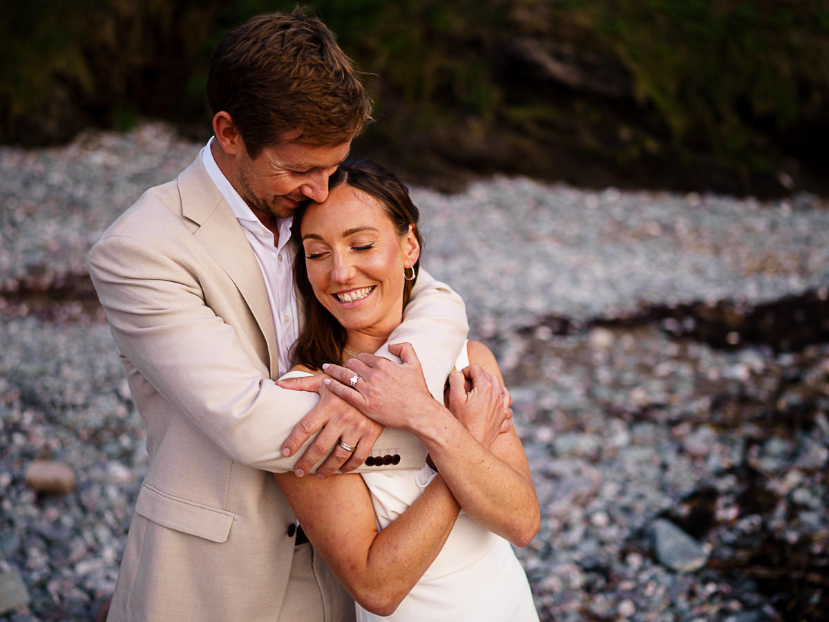Bride and groom at cornish beach
